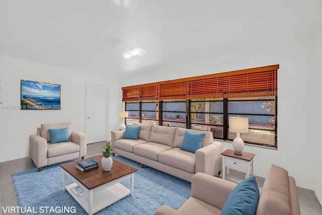 living room featuring tile patterned flooring