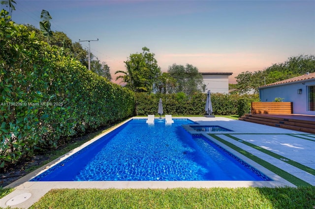 339 NE 100th St, Miami Shores, FL 33138 - view of pool with a pool with connected hot tub