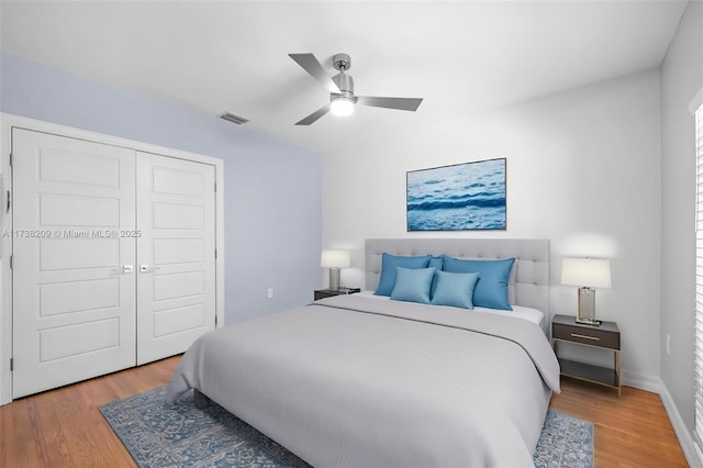 339 NE 100th St, Miami Shores, FL 33138 - bedroom with wood finished floors, a closet, ceiling fan, and baseboards