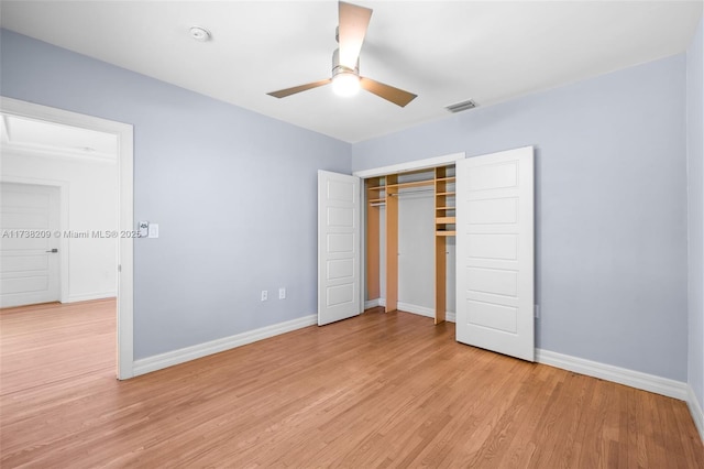 339 NE 100th St, Miami Shores, FL 33138 - unfurnished bedroom with light wood finished floors, baseboards, a closet, and a ceiling fan