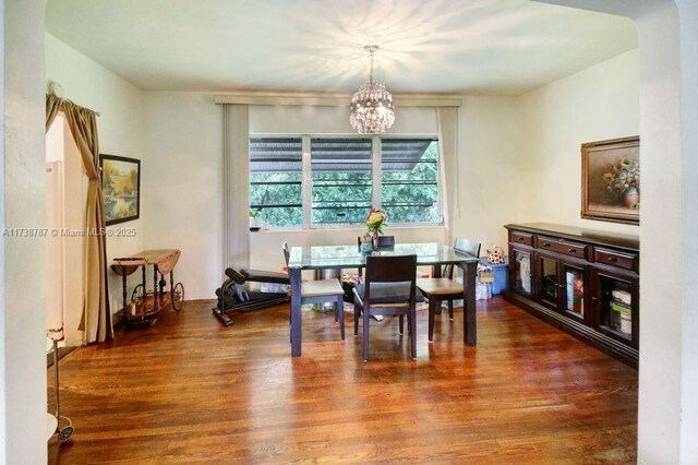 kitchen featuring tasteful backsplash, stainless steel fridge, sink, and electric range