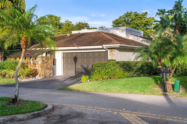 ranch-style home featuring a garage