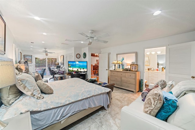 bedroom featuring ensuite bathroom and ceiling fan