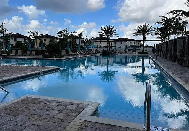 10519 W 33rd Ct Unit 10519, Hialeah, FL 33018 - community pool with fence