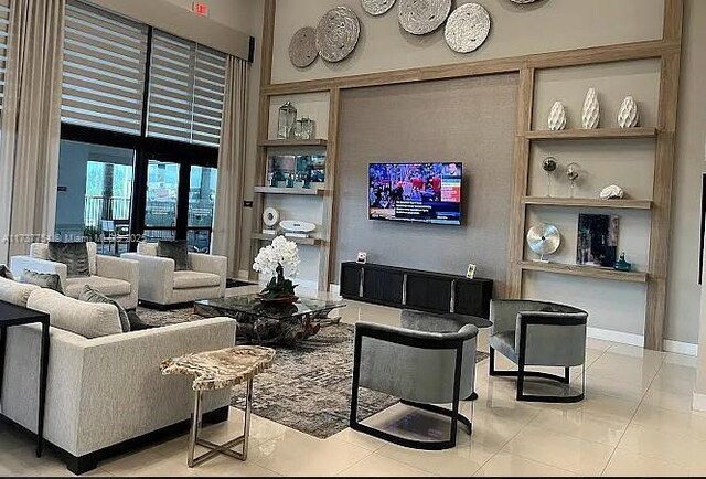 10519 W 33rd Ct Unit 10519, Hialeah, FL 33018 - common area with a towering ceiling