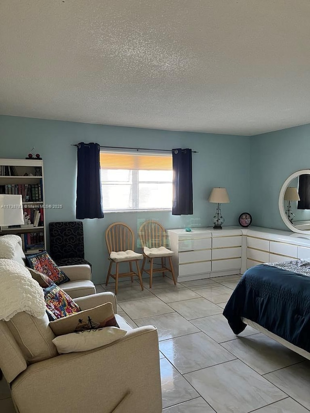 bedroom featuring a textured ceiling