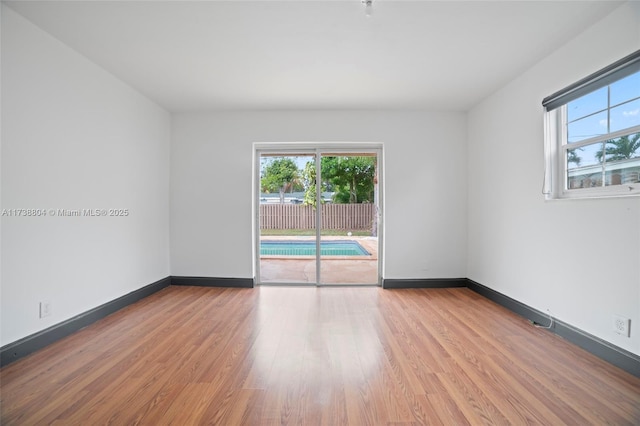 empty room featuring light hardwood / wood-style floors