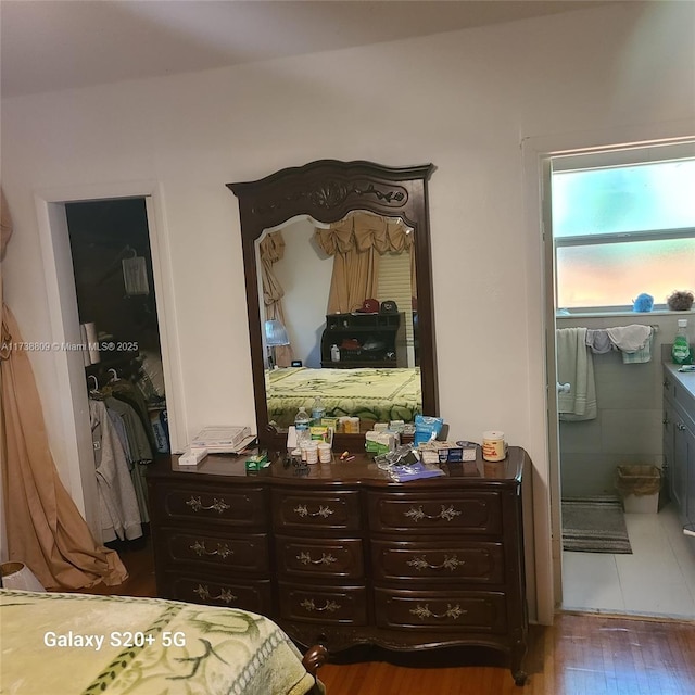 bedroom featuring hardwood / wood-style floors