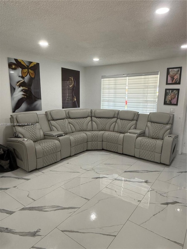 living room featuring a textured ceiling