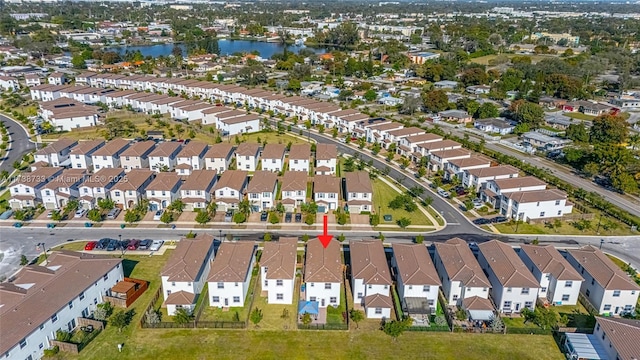 drone / aerial view with a water view