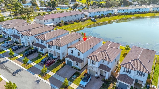 drone / aerial view with a water view