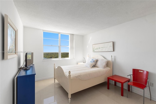 bedroom with a textured ceiling