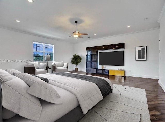 bedroom with dark hardwood / wood-style flooring, crown molding, and ceiling fan