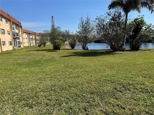 view of yard with a water view