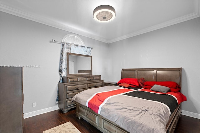 bedroom with ornamental molding and dark hardwood / wood-style flooring