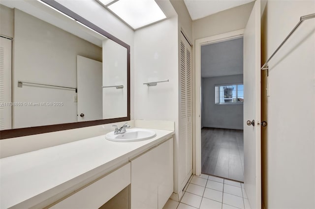 bathroom featuring vanity and tile patterned flooring