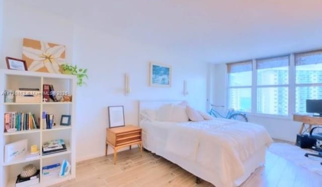 bedroom featuring light wood-type flooring