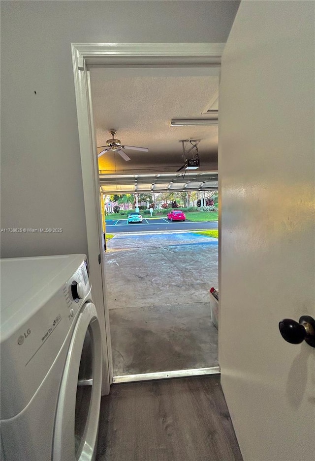 laundry area with ceiling fan, washer / dryer, and a textured ceiling