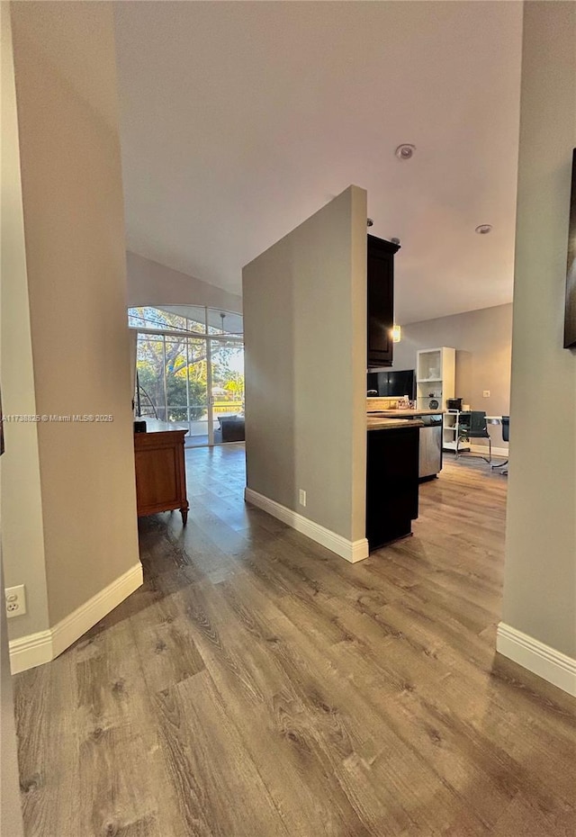 hallway featuring hardwood / wood-style floors