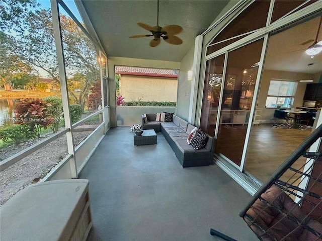 unfurnished sunroom with a water view