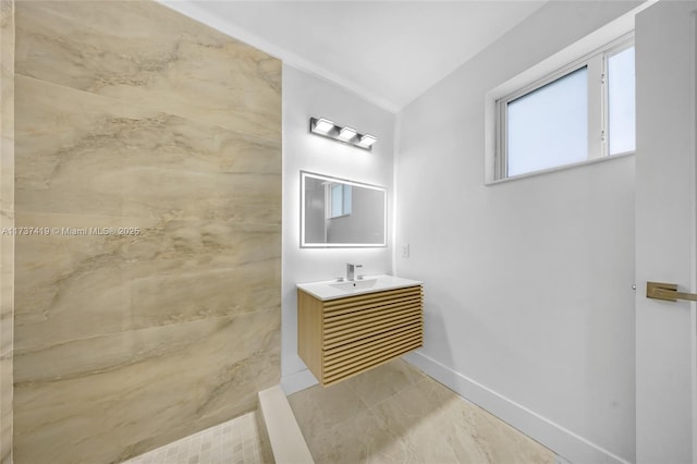 bathroom with vanity and tile patterned flooring