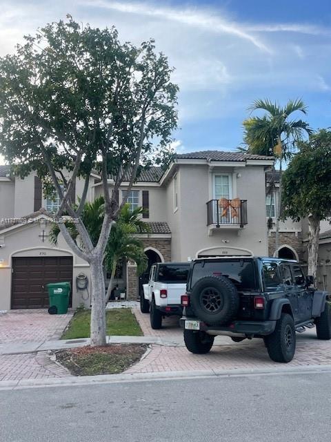 view of front of house with a garage