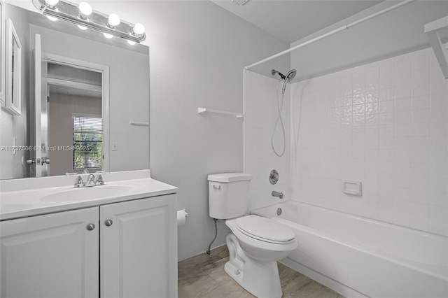 full bathroom with vanity, bathtub / shower combination, and toilet