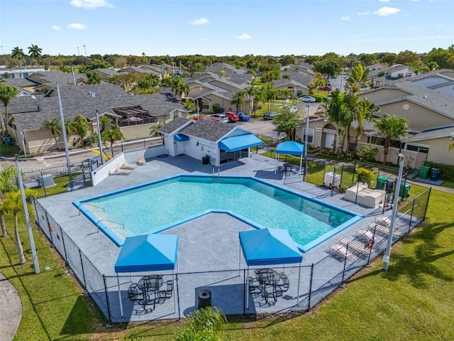 view of pool with a yard and a patio area