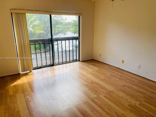 spare room featuring light hardwood / wood-style floors