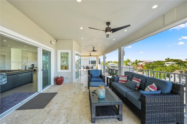 view of patio with outdoor lounge area and ceiling fan