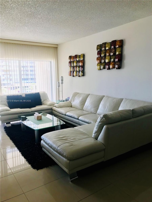 tiled living room with a textured ceiling