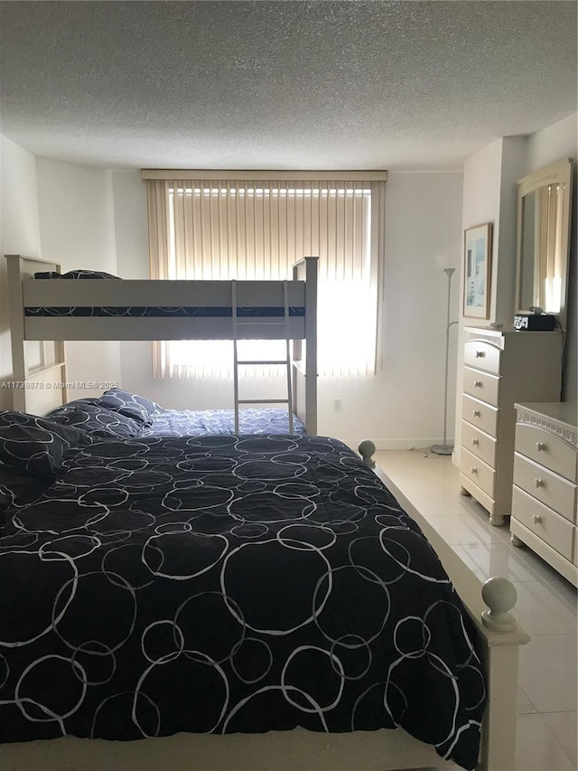 bedroom with a textured ceiling