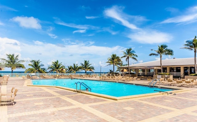 view of swimming pool featuring a patio