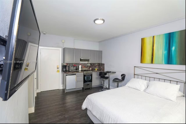 bedroom featuring dark wood-type flooring