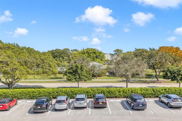 view of parking / parking lot