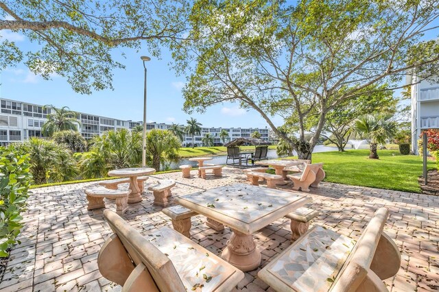 view of patio featuring a water view