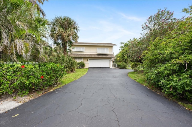 view of front of home featuring a garage