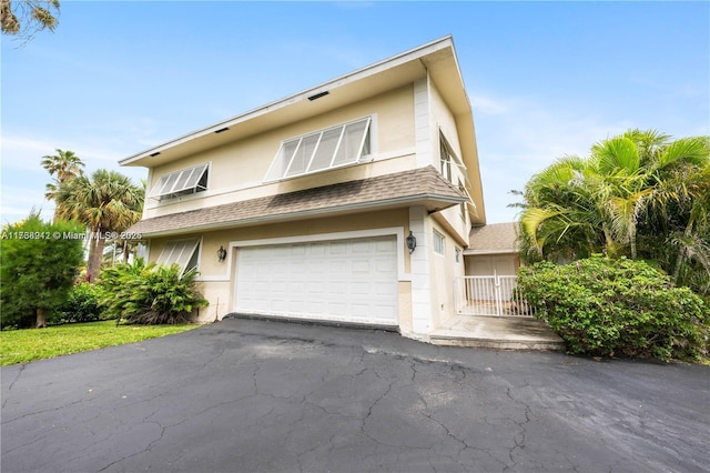 view of front of home featuring a garage