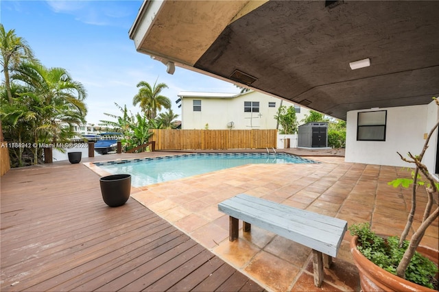 view of pool with a storage unit