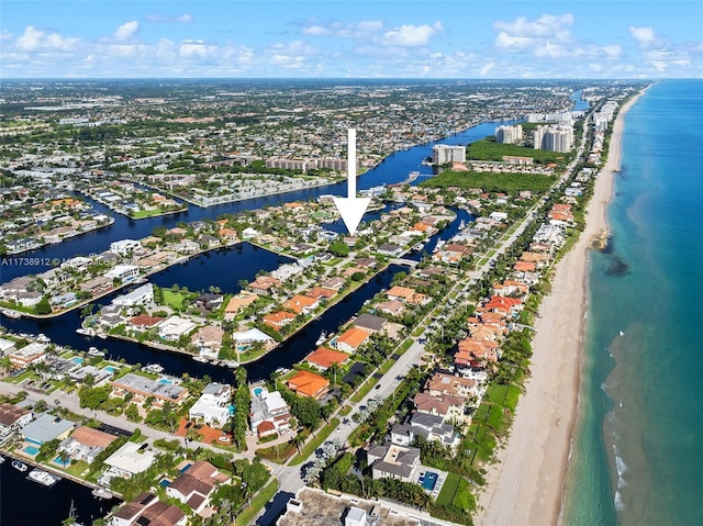 bird's eye view with a view of the beach and a water view