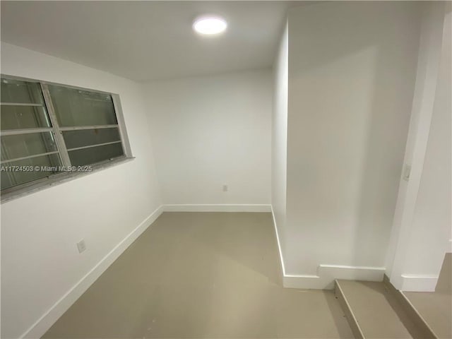 empty room featuring concrete floors