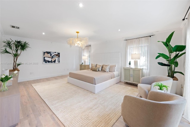 bedroom with ornamental molding, recessed lighting, and light wood-style floors