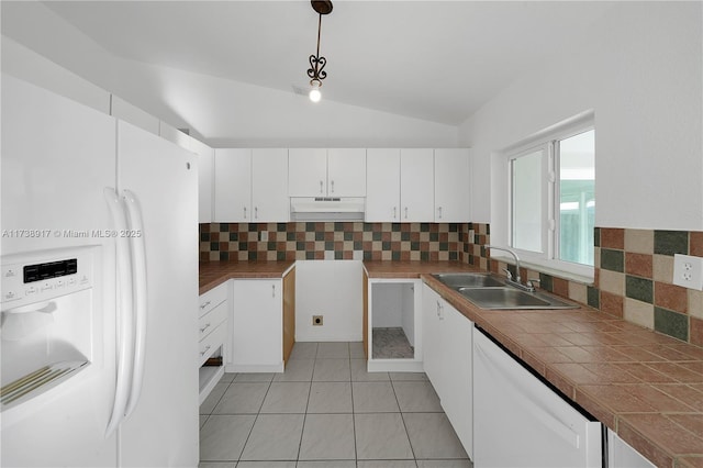 kitchen with sink, white cabinets, white appliances, and decorative light fixtures