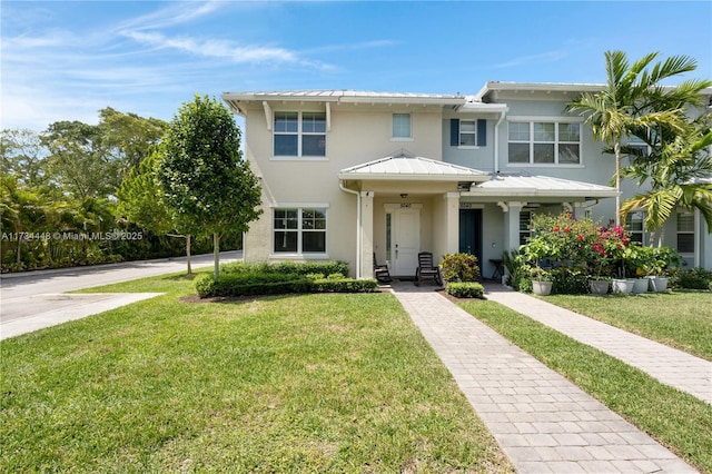 view of front of house with a front lawn