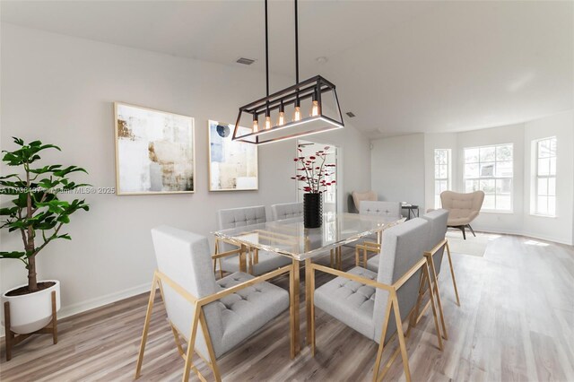 dining area with light wood-type flooring