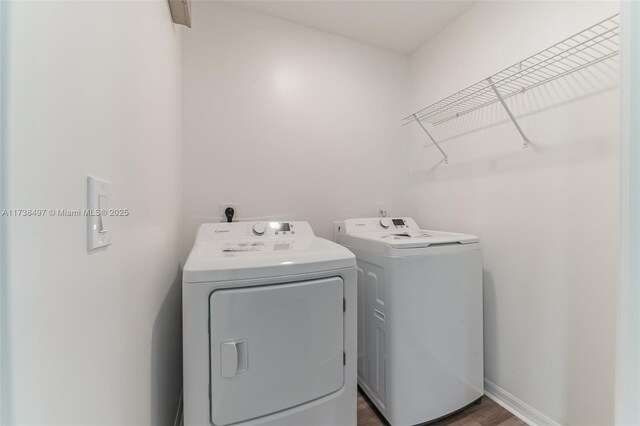 washroom featuring washer and dryer