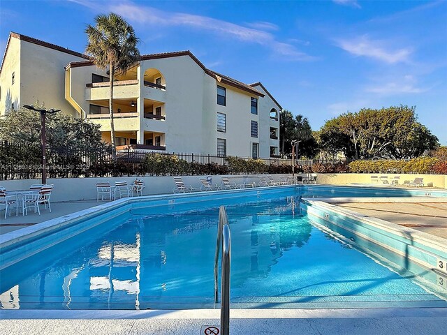 view of swimming pool featuring a patio