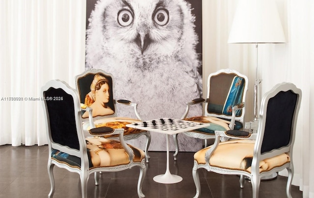 dining area featuring tile patterned flooring