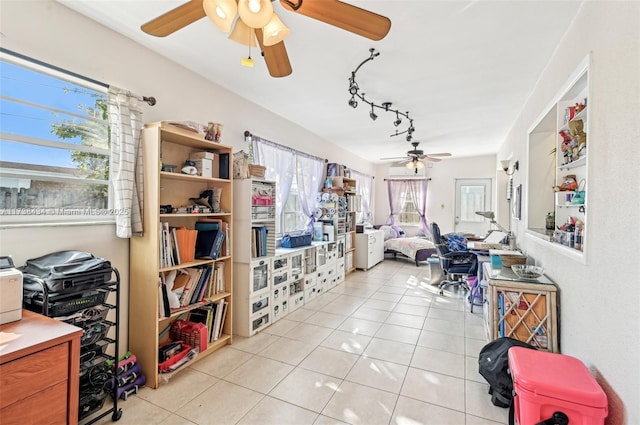 tiled office space with ceiling fan