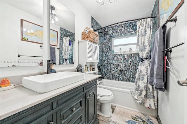 full bathroom featuring vanity, toilet, and shower / bath combo